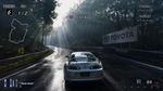 A screenshot from Gran Turismo 4 but with impossibly photorealistic graphics (the graphics are ultrarealistic, more realistic than the real life itself!)

